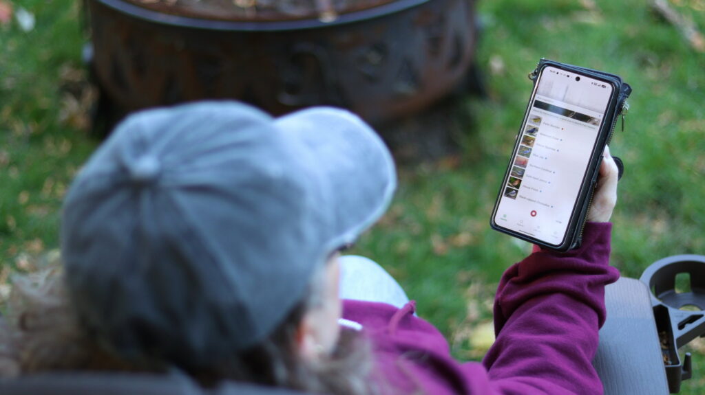 Cheryl Coles identifying birds by sound, using the Merlin app.